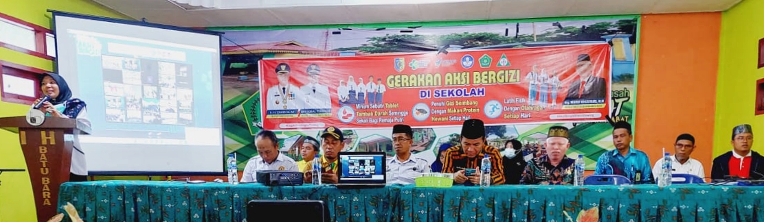 Teks foto: Gerakan Nasional Aksi Bergizi di Sekolah yang dilaksanakan Dinas Kesehatan PPKB, bersama Dinas Pendidikan, Bagian Kesra Setdakab, Kemenag, dan diikuti TP. PKK Kabupaten Batubara. (Ist)